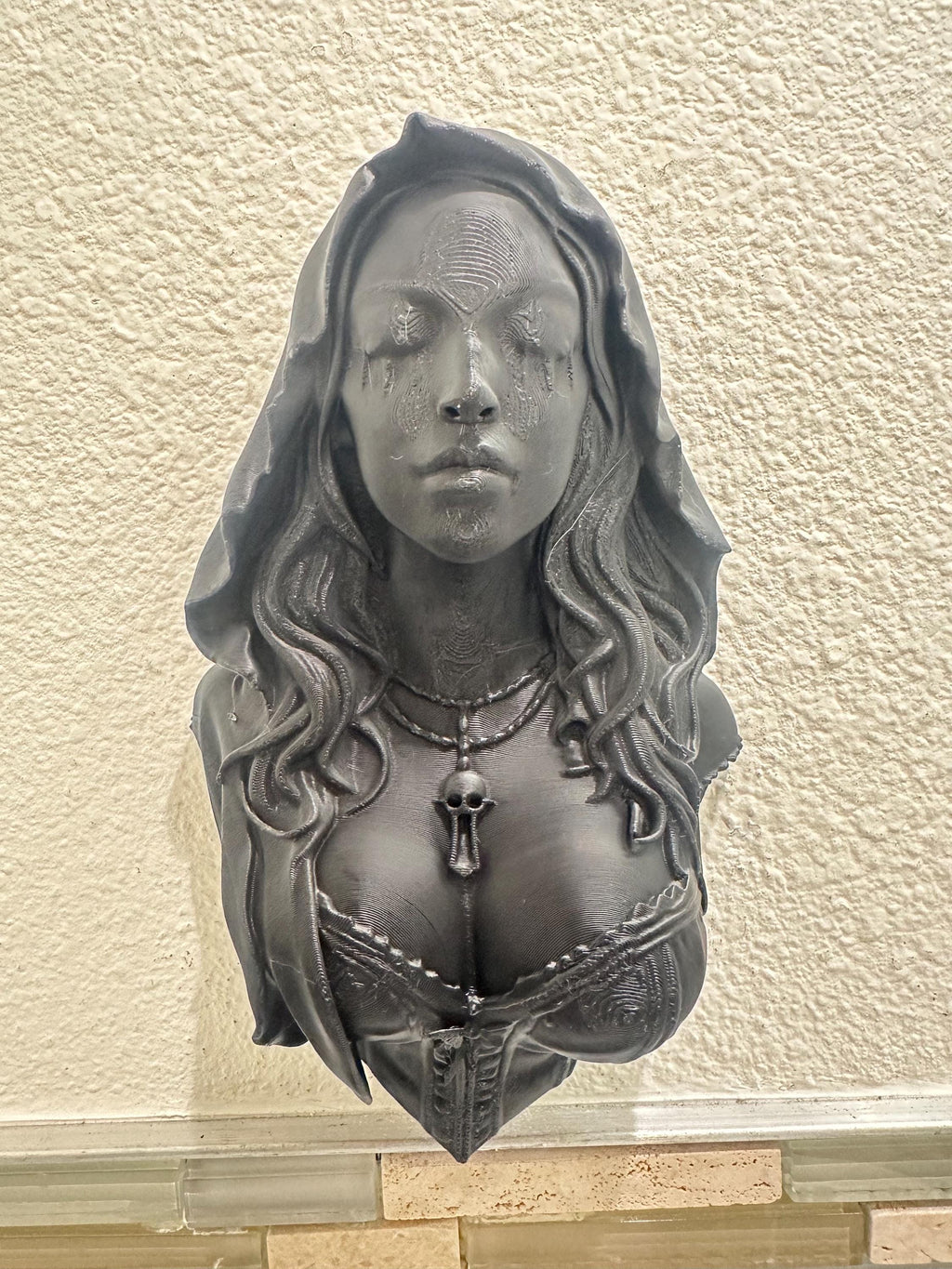 Gothic Hooded Woman with Eyes Sewn Shut Wall Sculpture