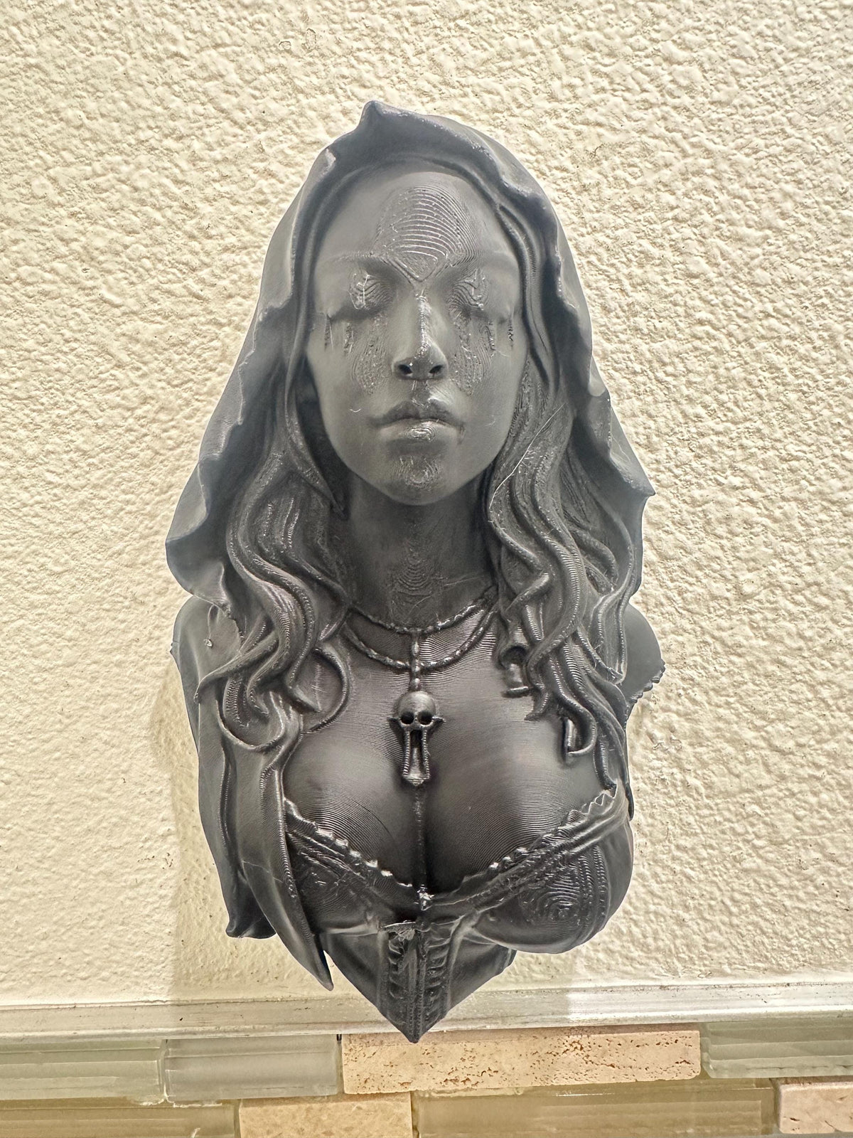 Gothic Hooded Woman with Eyes Sewn Shut Wall Sculpture
